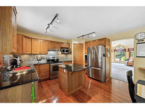 75 Schubert Hill Nw, Calgary, AB - Indoor Photo Showing Kitchen With Stainless Steel Kitchen