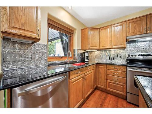 75 Schubert Hill Nw, Calgary, AB - Indoor Photo Showing Kitchen With Stainless Steel Kitchen With Double Sink