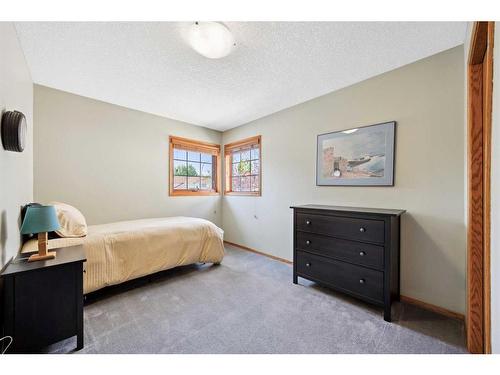 75 Schubert Hill Nw, Calgary, AB - Indoor Photo Showing Bedroom