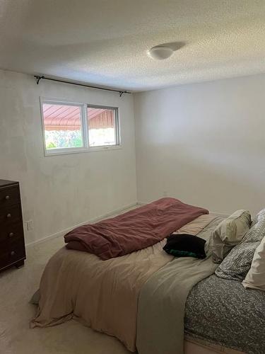 1138 Great Lakes Road South, Lethbridge, AB - Indoor Photo Showing Bedroom