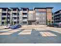 2405-55 Lucas Way, Calgary, AB  - Outdoor With Balcony With Facade 