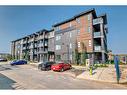 2405-55 Lucas Way, Calgary, AB  - Outdoor With Balcony With Facade 