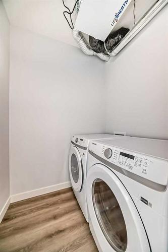 2405-55 Lucas Way, Calgary, AB - Indoor Photo Showing Laundry Room