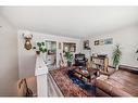 8932 33 Avenue Nw, Calgary, AB  - Indoor Photo Showing Living Room 