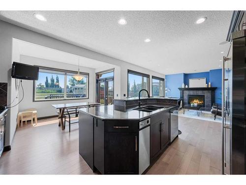 290 Kingsbury View Se, Airdrie, AB - Indoor Photo Showing Kitchen With Double Sink