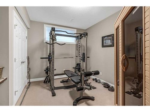 167 Aspen Summit View Sw, Calgary, AB - Indoor Photo Showing Gym Room