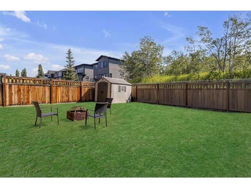 167 Aspen Summit View Sw, Calgary, AB - Outdoor With Backyard
