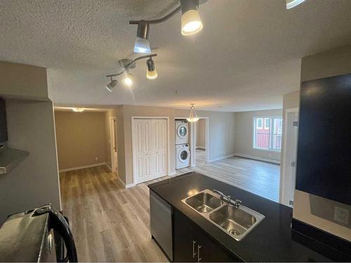 123-195 Kincora Glen Road Nw, Calgary, AB - Indoor Photo Showing Kitchen With Double Sink