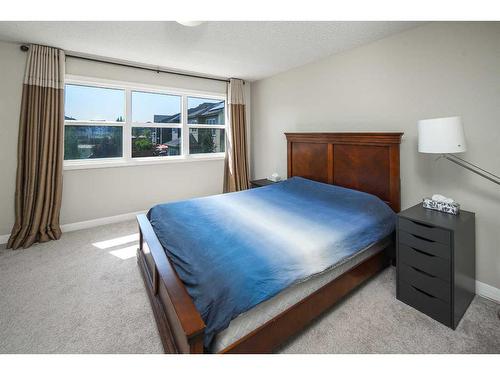 338 Evansglen Drive Nw, Calgary, AB - Indoor Photo Showing Bedroom