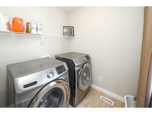 338 Evansglen Drive Nw, Calgary, AB - Indoor Photo Showing Laundry Room