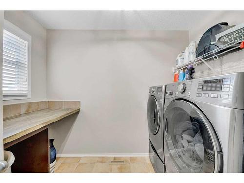 44 Auburn Sound Court Se, Calgary, AB - Indoor Photo Showing Laundry Room