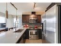 402-1320 1 Street Se, Calgary, AB  - Indoor Photo Showing Kitchen With Stainless Steel Kitchen With Double Sink With Upgraded Kitchen 