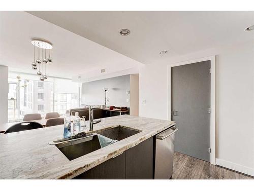 705-519 Riverfront Avenue Se, Calgary, AB - Indoor Photo Showing Kitchen With Double Sink