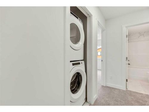 322 Sage Hill Circle Nw, Calgary, AB - Indoor Photo Showing Laundry Room