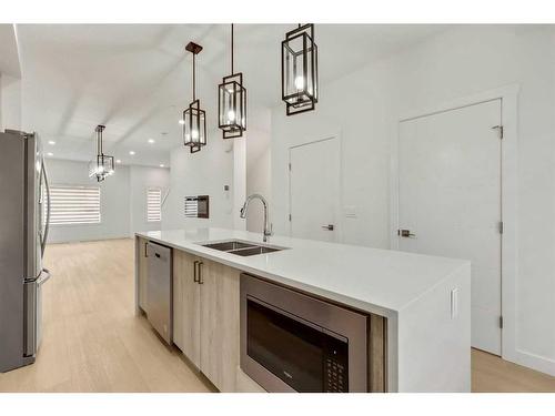 322 Sage Hill Circle Nw, Calgary, AB - Indoor Photo Showing Kitchen With Double Sink