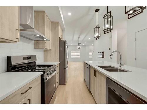 322 Sage Hill Circle Nw, Calgary, AB - Indoor Photo Showing Kitchen With Stainless Steel Kitchen With Double Sink With Upgraded Kitchen