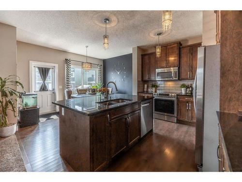 1362 Bayside Drive Sw, Airdrie, AB - Indoor Photo Showing Kitchen With Double Sink