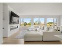 65 Rowmont Link Nw, Calgary, AB  - Indoor Photo Showing Living Room 