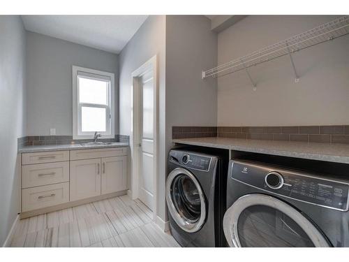 280 Masters Cove Se, Calgary, AB - Indoor Photo Showing Laundry Room