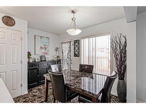 42 Evansford Grove Nw, Calgary, AB - Indoor Photo Showing Dining Room