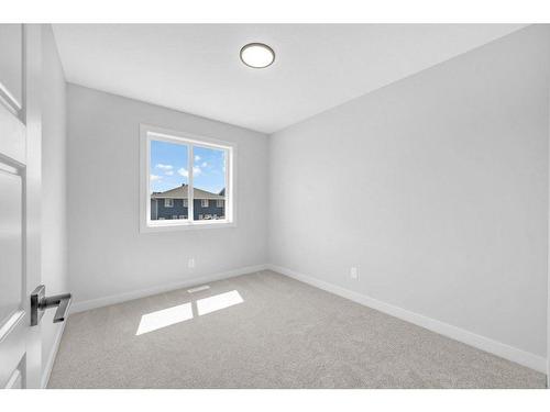 27 Amblefield Avenue Nw, Calgary, AB - Indoor Photo Showing Other Room