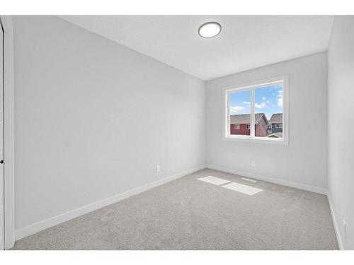 27 Amblefield Avenue Nw, Calgary, AB - Indoor Photo Showing Other Room