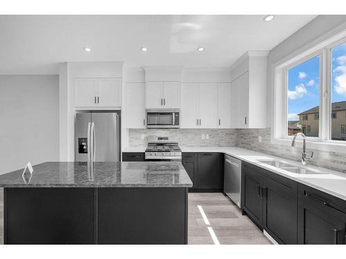 27 Amblefield Avenue Nw, Calgary, AB - Indoor Photo Showing Kitchen With Double Sink With Upgraded Kitchen