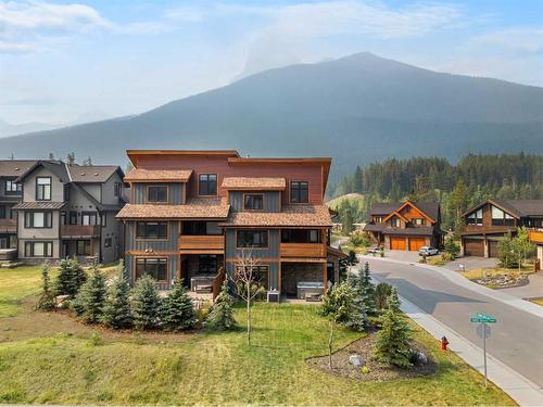 414 Stewart Creek Close, Canmore, AB - Outdoor With Balcony With Facade