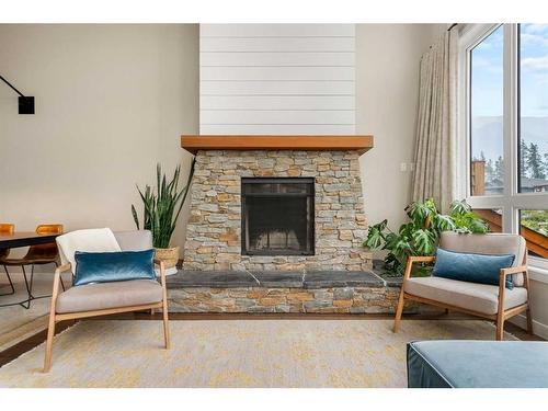 414 Stewart Creek Close, Canmore, AB - Indoor Photo Showing Living Room With Fireplace