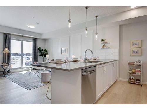 104-245 Edith Place Nw, Calgary, AB - Indoor Photo Showing Kitchen With Upgraded Kitchen