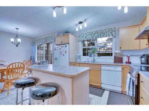 157-7707 Martha'S Haven Park Ne, Calgary, AB - Indoor Photo Showing Kitchen With Double Sink