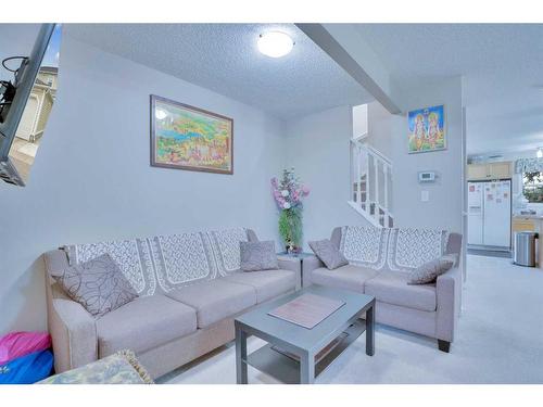 157-7707 Martha'S Haven Park Ne, Calgary, AB - Indoor Photo Showing Living Room