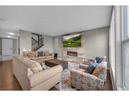 134 Red Sky Green Ne, Calgary, AB - Indoor Photo Showing Living Room With Fireplace