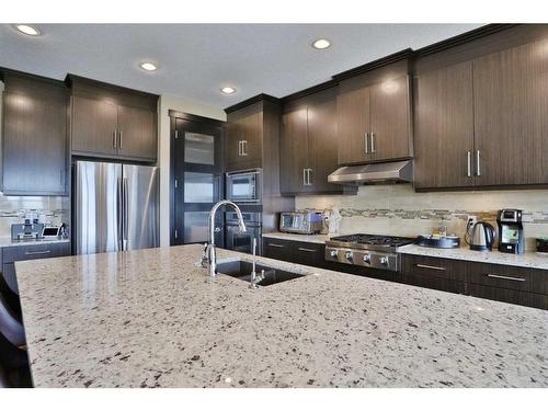 31 Sage Bank Place Nw, Calgary, AB - Indoor Photo Showing Kitchen With Stainless Steel Kitchen With Double Sink With Upgraded Kitchen