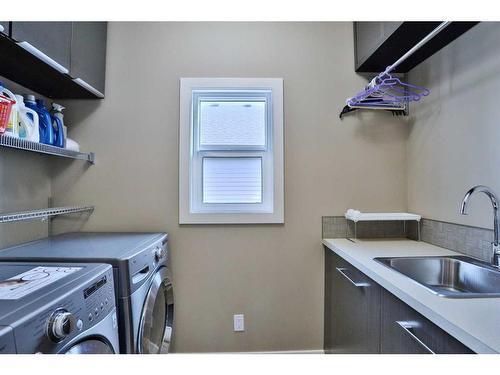 31 Sage Bank Place Nw, Calgary, AB - Indoor Photo Showing Laundry Room