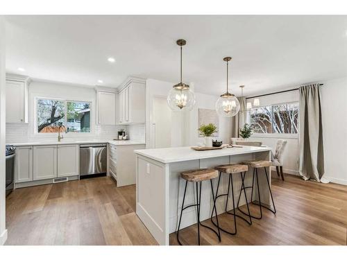 8223 4A Street Sw, Calgary, AB - Indoor Photo Showing Kitchen With Upgraded Kitchen