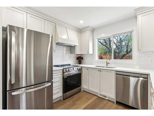 8223 4A Street Sw, Calgary, AB - Indoor Photo Showing Kitchen With Stainless Steel Kitchen With Double Sink With Upgraded Kitchen