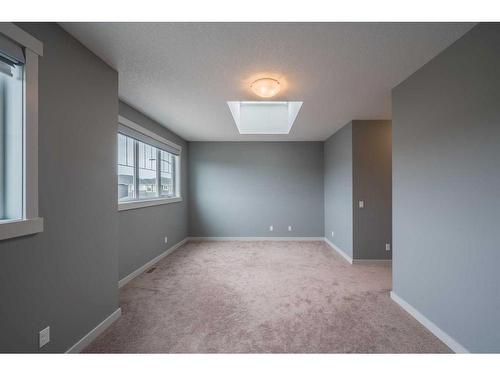 568 Evansborough Way Nw, Calgary, AB - Indoor Photo Showing Other Room