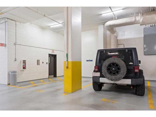 1806-108 9 Avenue Sw, Calgary, AB - Indoor Photo Showing Garage