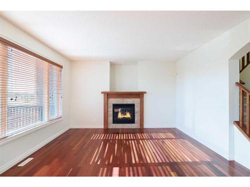 368 Evanspark Circle Nw, Calgary, AB - Indoor Photo Showing Living Room With Fireplace