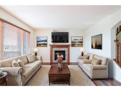 368 Evanspark Circle Nw, Calgary, AB - Indoor Photo Showing Living Room With Fireplace