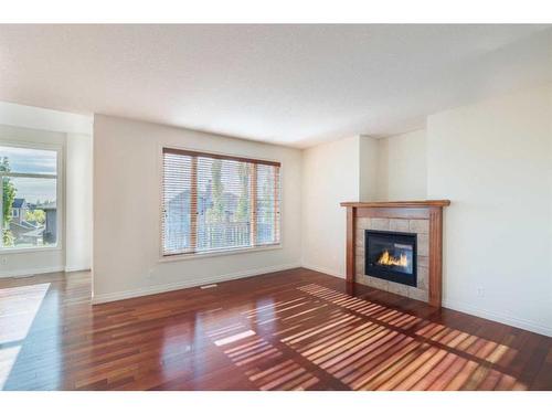 368 Evanspark Circle Nw, Calgary, AB - Indoor Photo Showing Living Room With Fireplace