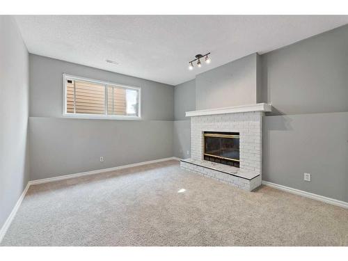 6567 Martingrove Drive Ne, Calgary, AB - Indoor With Fireplace