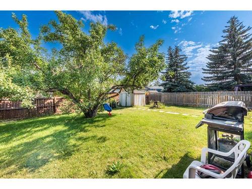 215 Rundlecairn Road Ne, Calgary, AB - Outdoor With Backyard