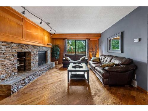 33 Sunhaven Close Se, Calgary, AB - Indoor Photo Showing Living Room With Fireplace