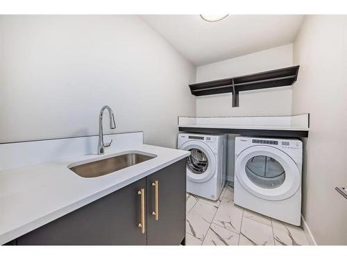 544 Walgrove Boulevard Se, Calgary, AB - Indoor Photo Showing Laundry Room