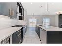 544 Walgrove Boulevard Se, Calgary, AB  - Indoor Photo Showing Kitchen With Stainless Steel Kitchen With Double Sink With Upgraded Kitchen 