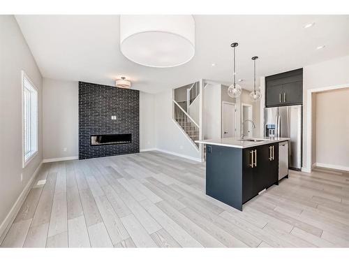 544 Walgrove Boulevard Se, Calgary, AB - Indoor With Fireplace