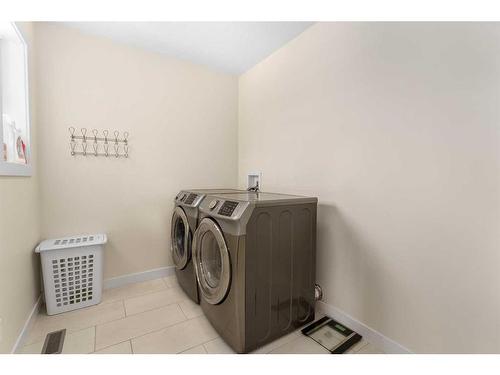 1167 Copperfield Boulevard Se, Calgary, AB - Indoor Photo Showing Laundry Room