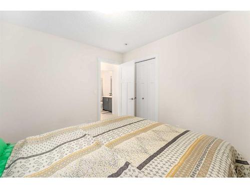 1167 Copperfield Boulevard Se, Calgary, AB - Indoor Photo Showing Bedroom